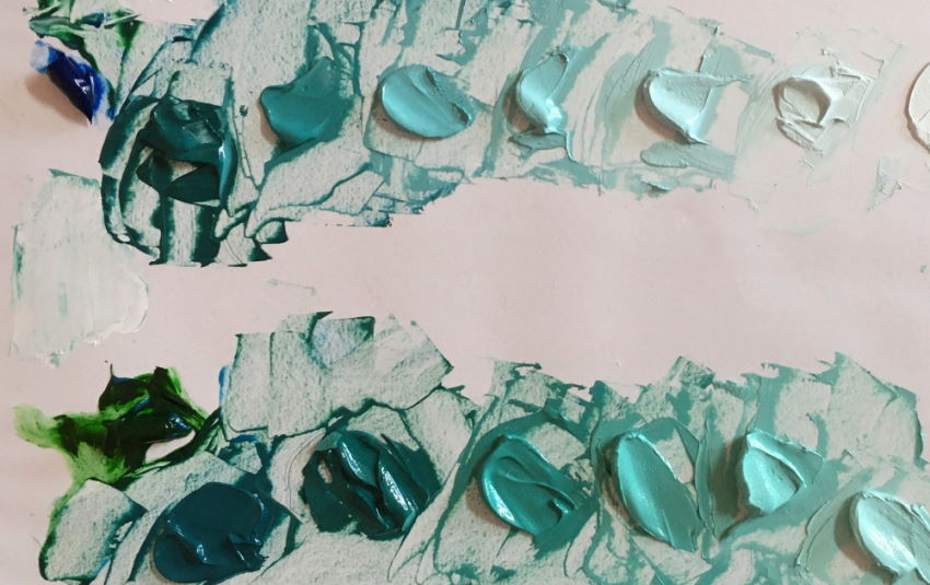 Using blue and green to mix turquoise oil paint