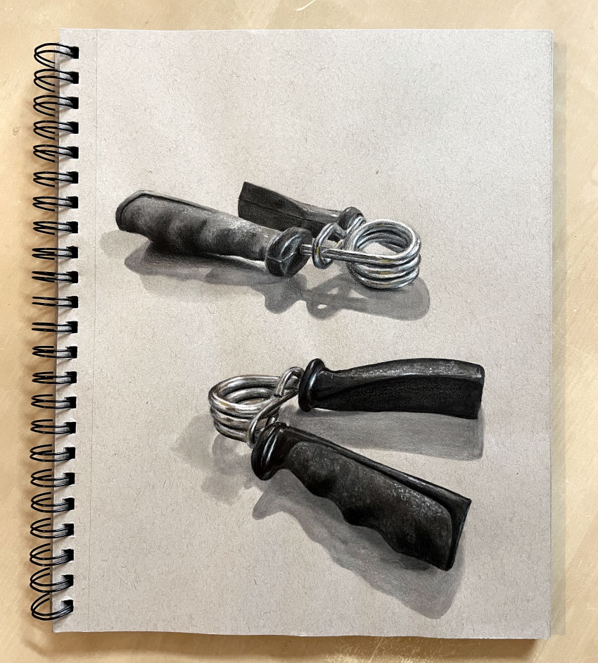 Realistic marker drawing of two hand grippers