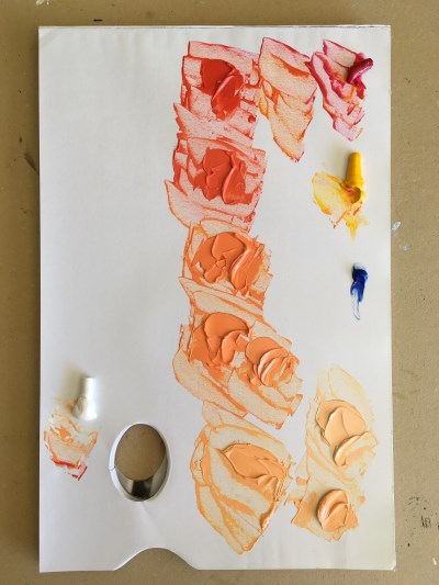 Mixing colors on a paper palette