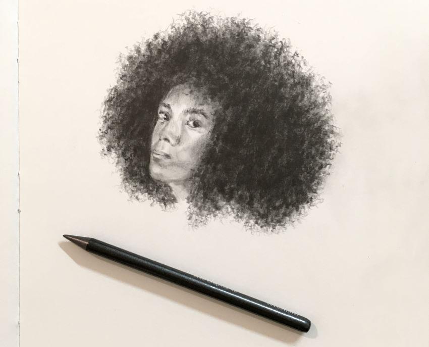 Portrait with curly hair drawing with graphite stick